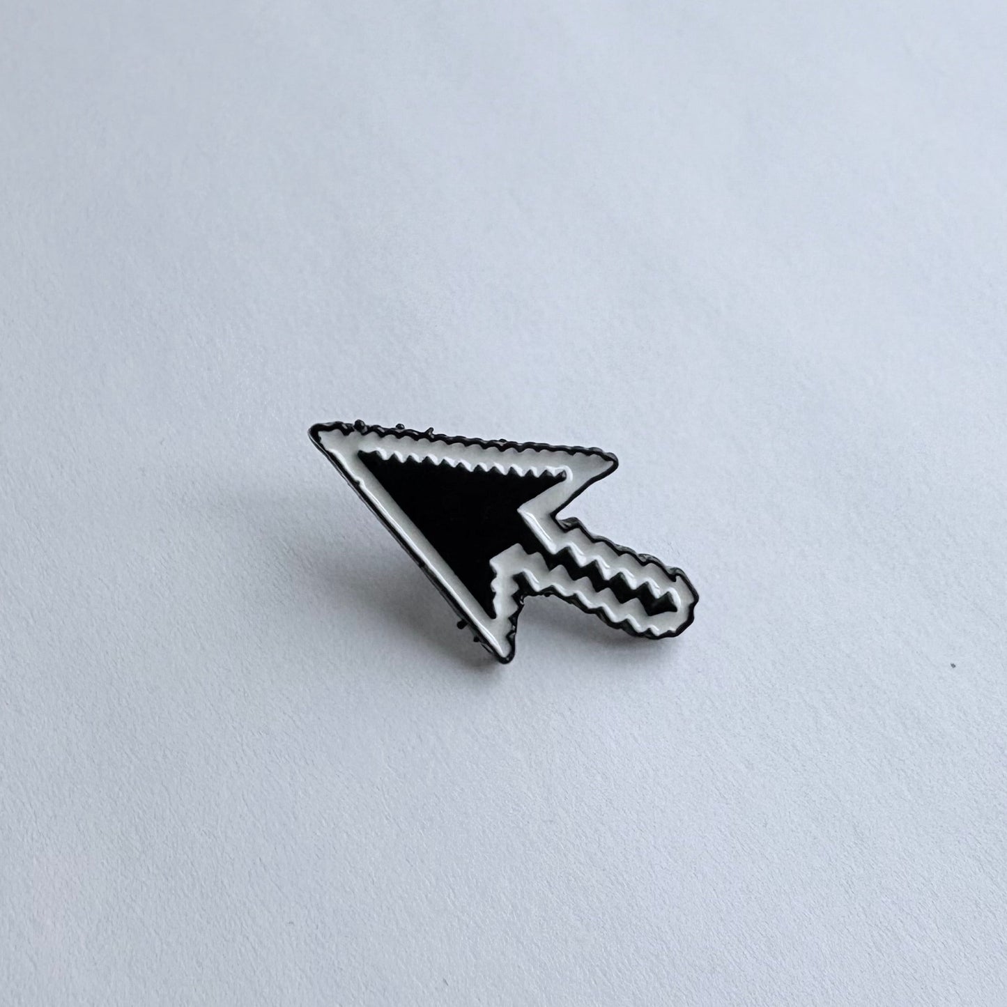 pixelated Black and white mouse pointer n white background 