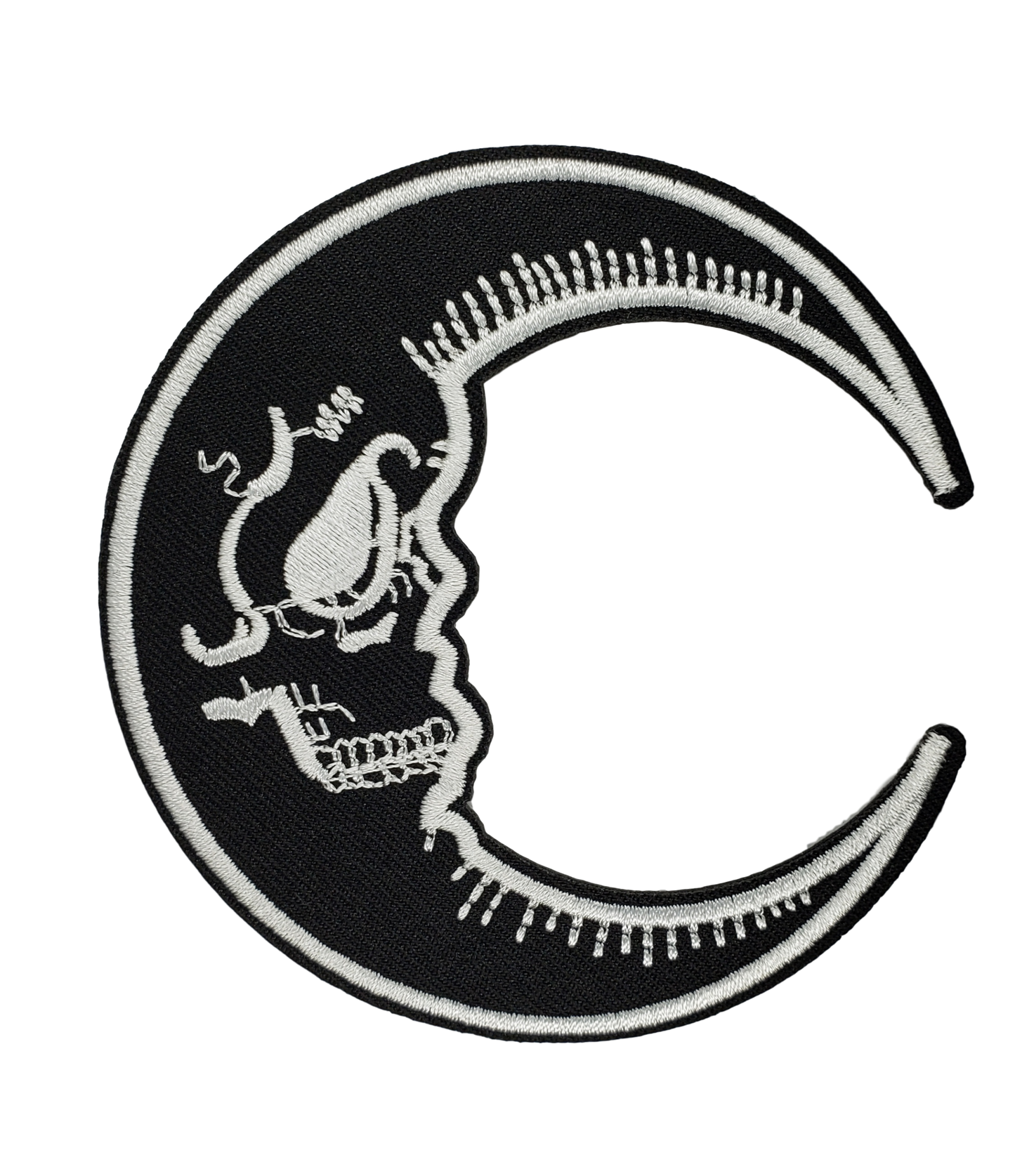 Crescent Moon patch with skull face, black and white.
