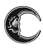 Crescent Moon patch with skull face, black and white.